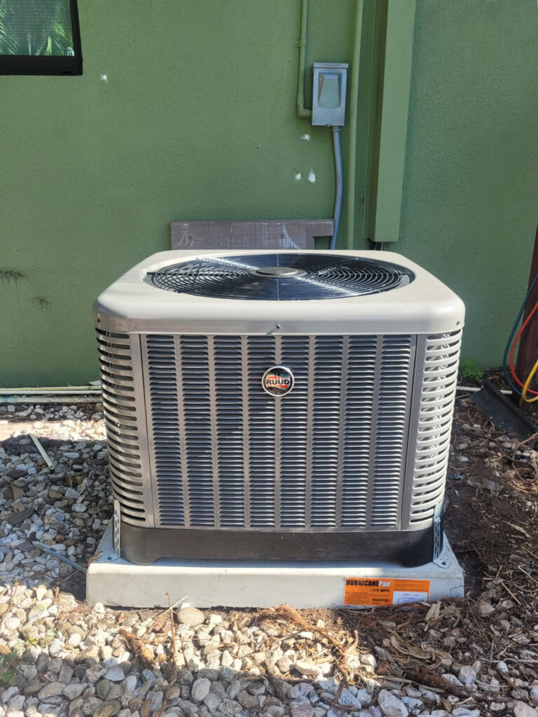 Ruud outdoor unit installed at a residence in Delray Beach by Swift Air Conditioning